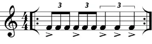 A measure of 4/4 with eighth note triplets with accents on the beat on beats 1 and 2 and quarter note triplets on beats 3 and 4.